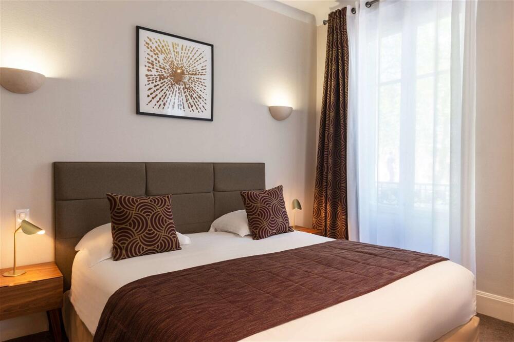 Foto de una habitación de The Originals Boutique, Hôtel Les Nations, Vichy