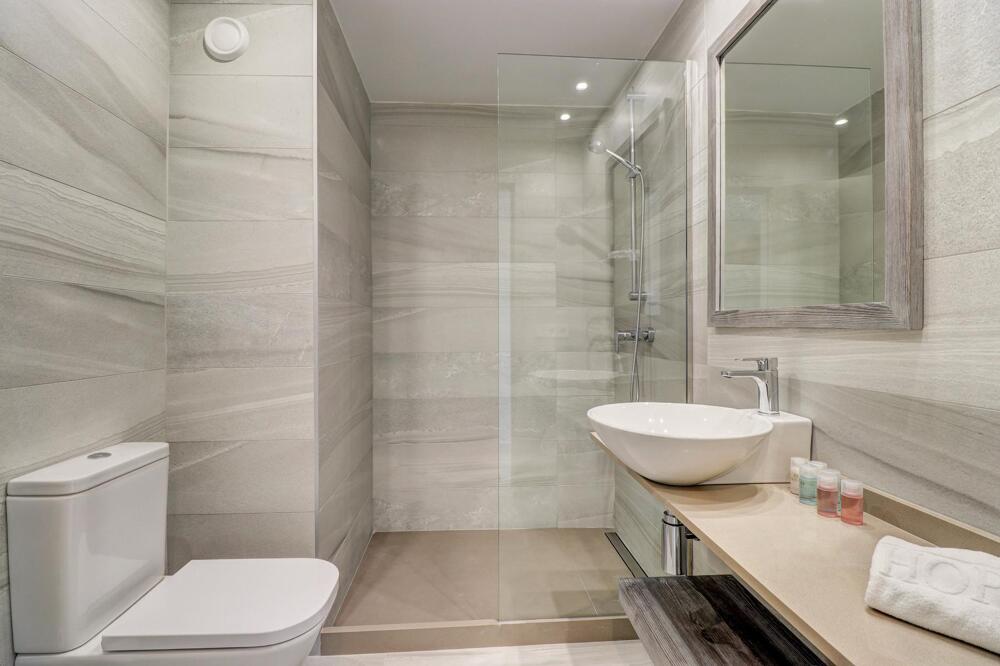 Foto del baño de Hotel Hoposa Pollentia - Adults Only
