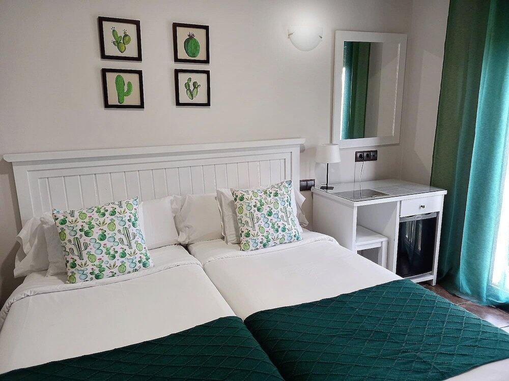 Foto de una habitación de Hotel Medina de Toledo