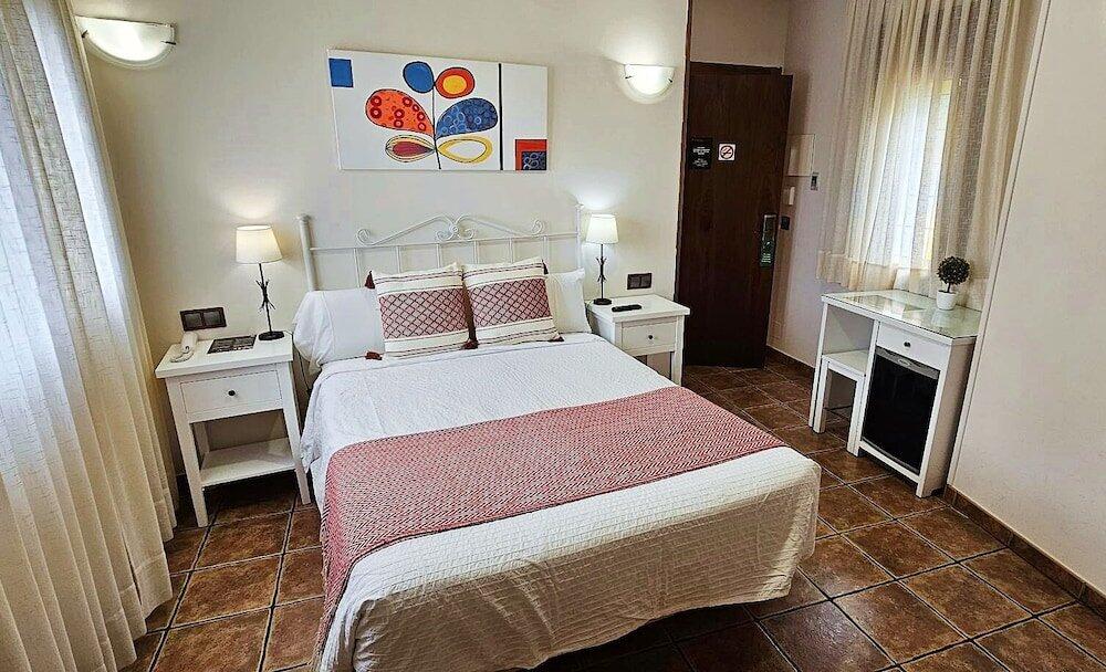 Foto de una habitación de Hotel Medina de Toledo