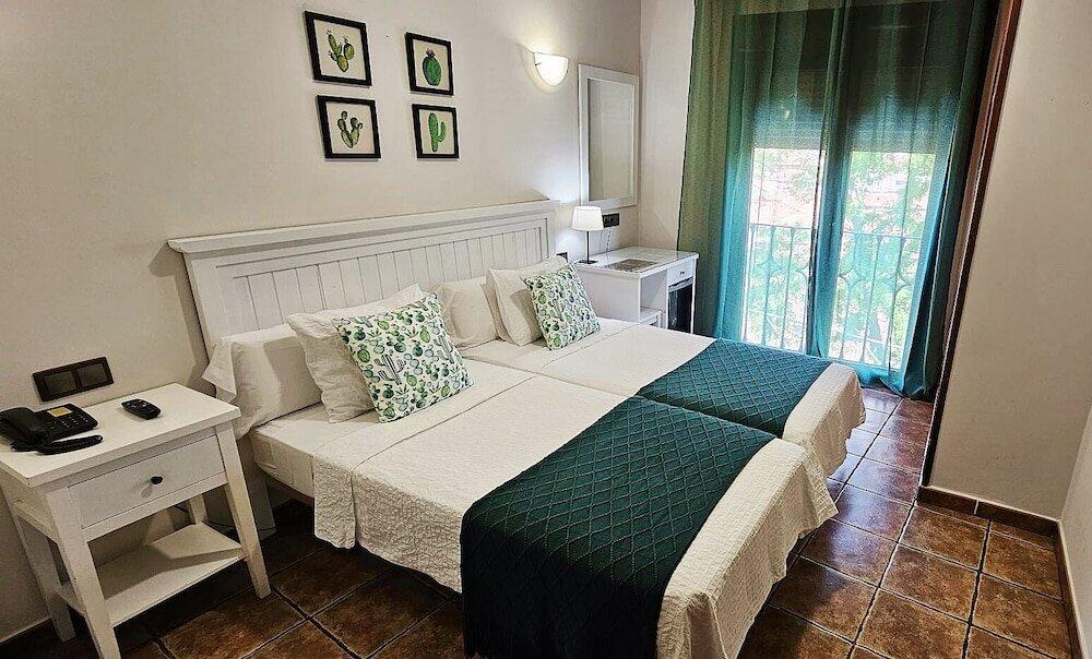 Foto de una habitación de Hotel Medina de Toledo