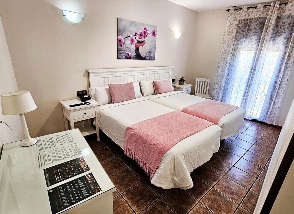 Foto de una habitación de Hotel Medina de Toledo