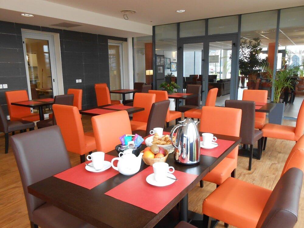 Foto de restauración de Aparthotel Odalys City Lyon Bioparc