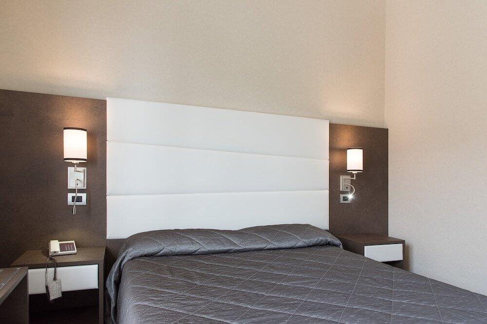 Foto de una habitación de Reginna Palace Hotel