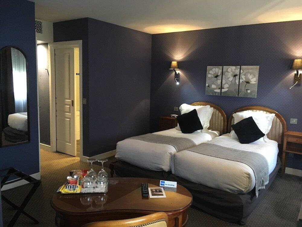 Foto de una habitación de Hôtel Henry II Beaune Centre
