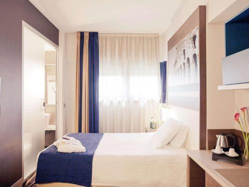Foto de una habitación de Hotel Mercure Roma Centro Colosseo