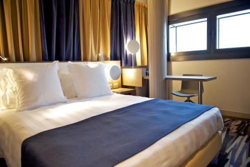 Foto de una habitación de Hotel Mercure Roma Centro Colosseo