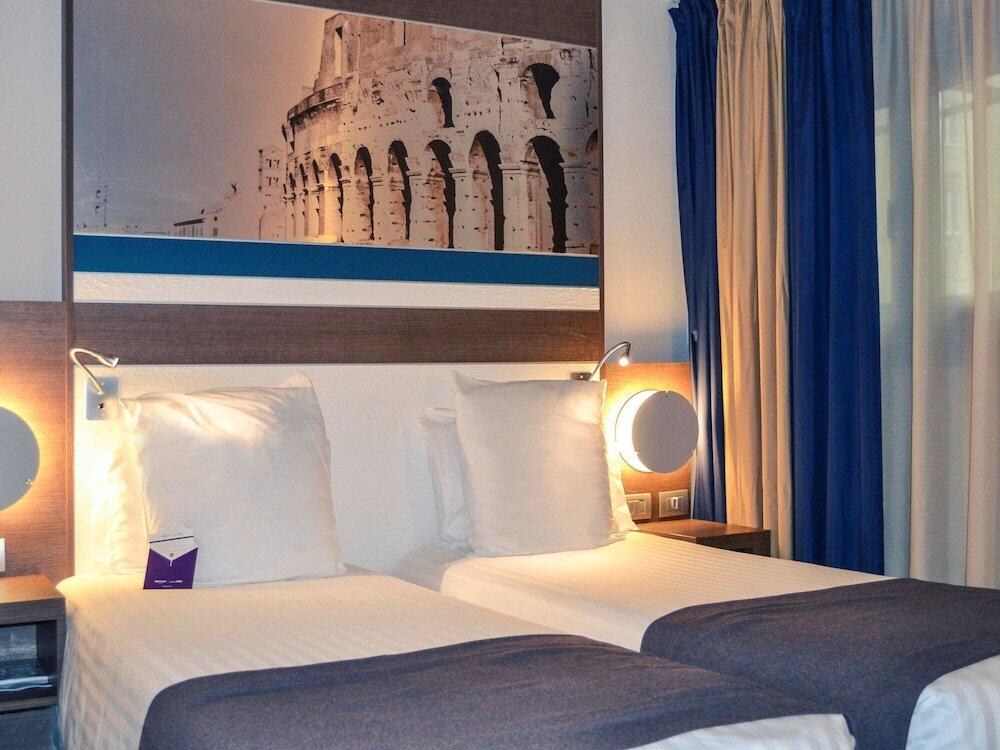 Foto de una habitación de Hotel Mercure Roma Centro Colosseo