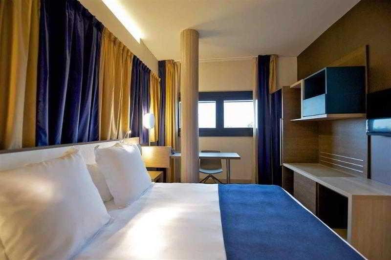 Foto de una habitación de Hotel Mercure Roma Centro Colosseo