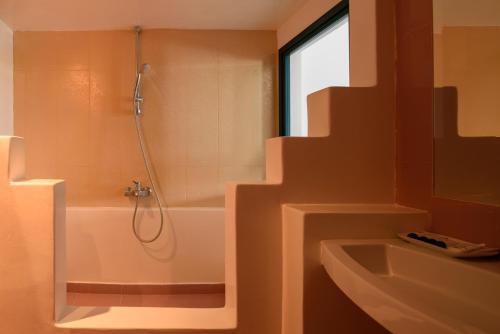 Foto del baño de Veggera Beach Hotel