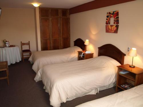 Foto de una habitación de Qelqatani Hotel