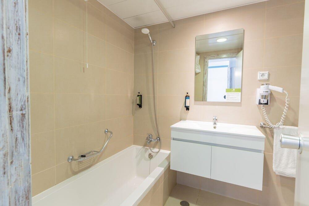 Foto del baño de Aparthotel Vila Baleira Suites