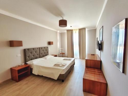 Foto de una habitación de Hotel Toscana Verde