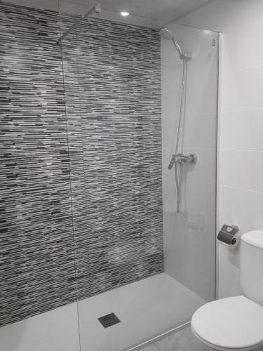 Foto del baño de Aparthotel Las Mariposas