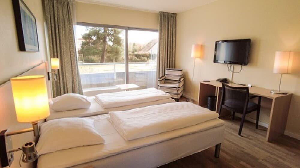 Foto de una habitación de Hotel Marina