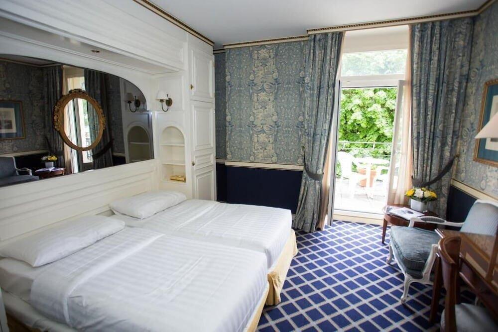 Foto de una habitación de Carlton Lausanne Boutique Hôtel