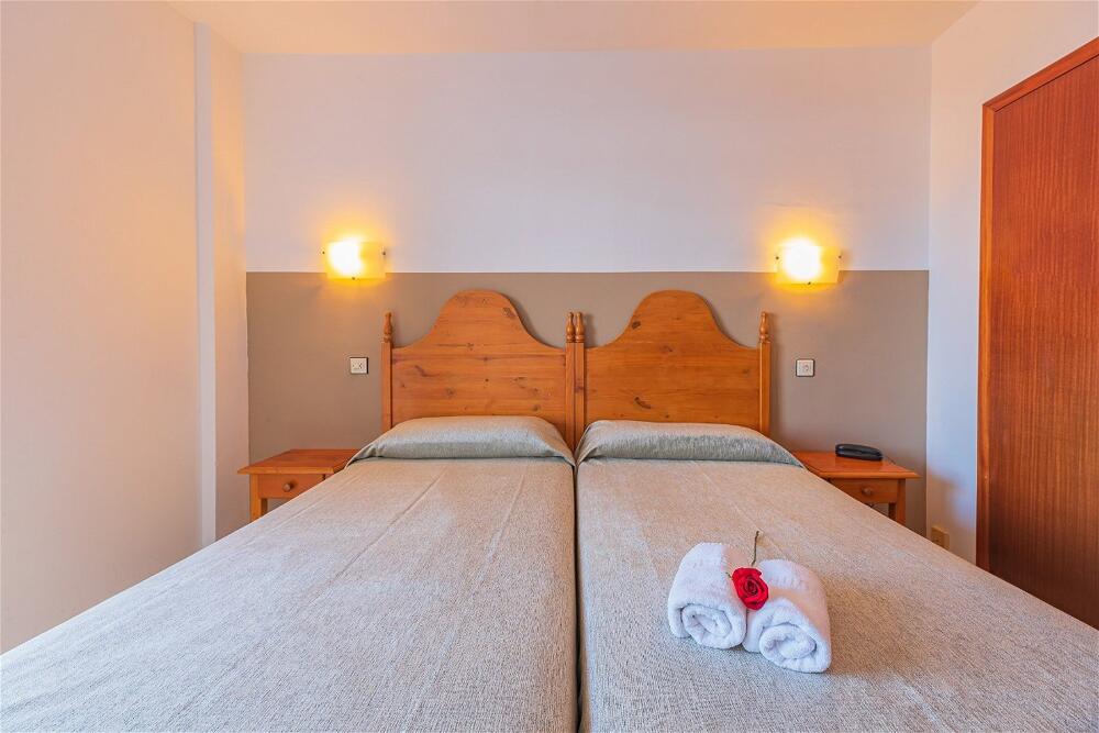 Foto de una habitación de Aparthotel Xon&amp;#039;s Platja HA