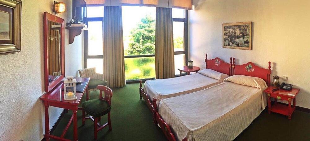Foto de una habitación de Hotel El Ancla