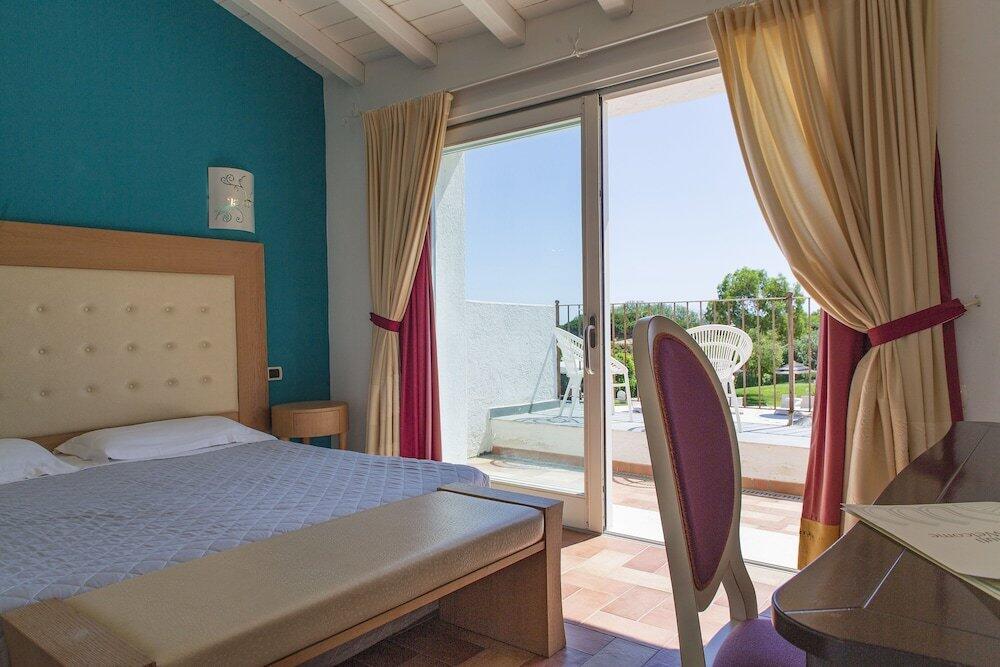 Foto de una habitación de Hotel Villas Resort