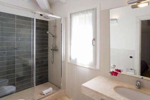 Foto del baño de Hotel Villas Resort