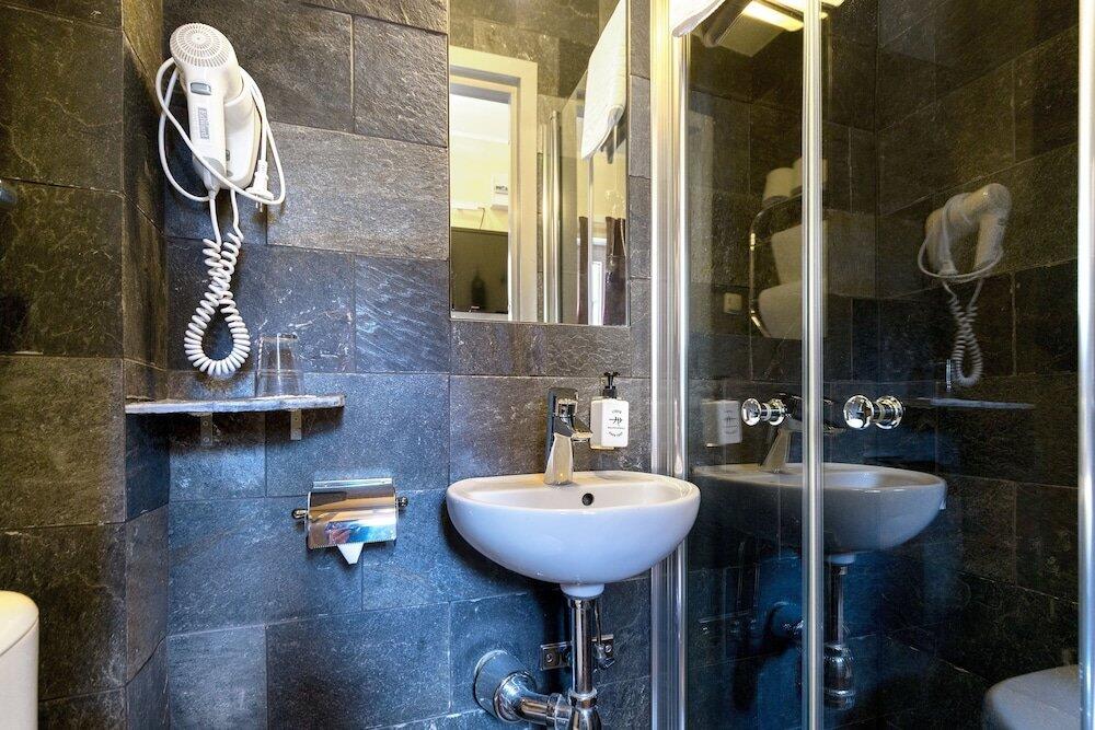 Foto del baño de Rex Hotel