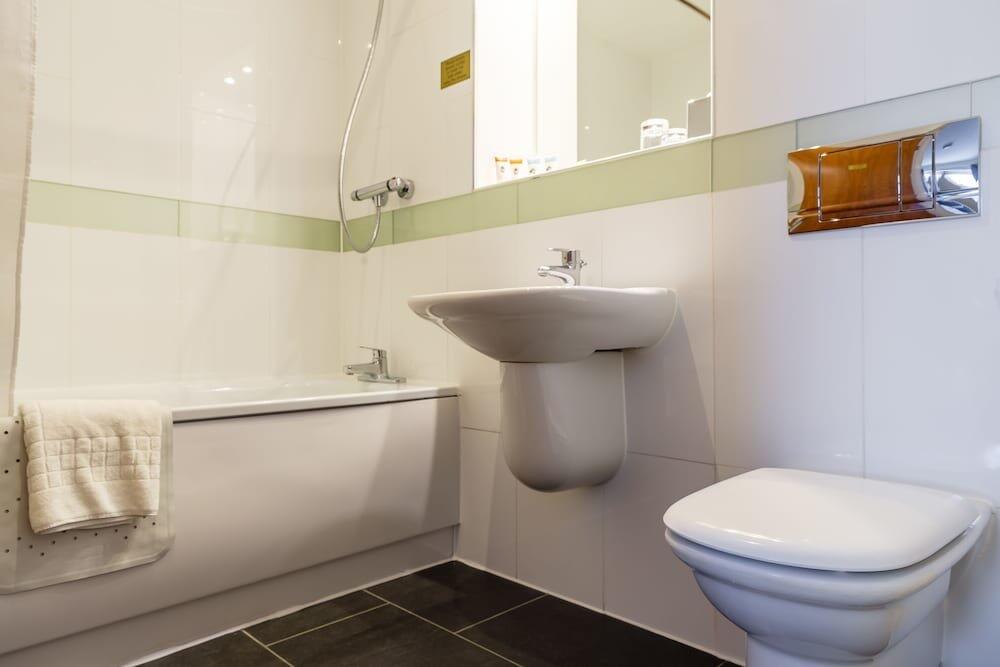 Foto del baño de Legacy Preston International Hotel