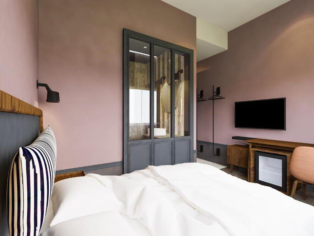 Foto de una habitación de The Jesselton Hotel