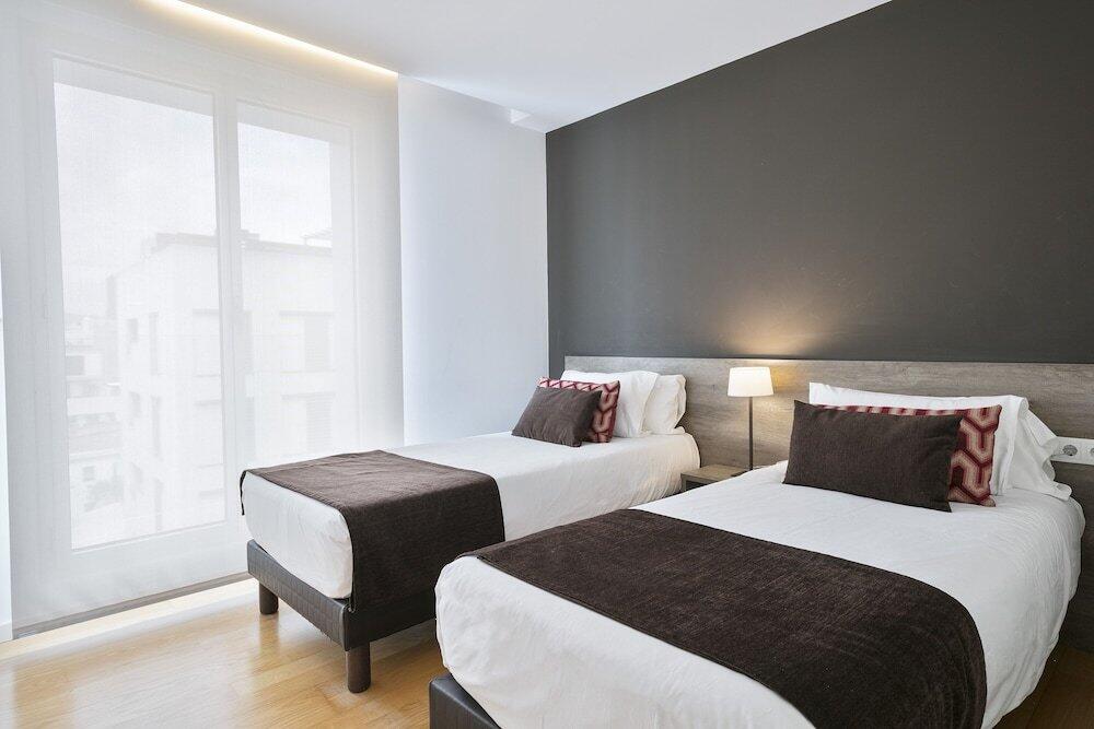 Foto de una habitación de Lugaris Beach Apartments