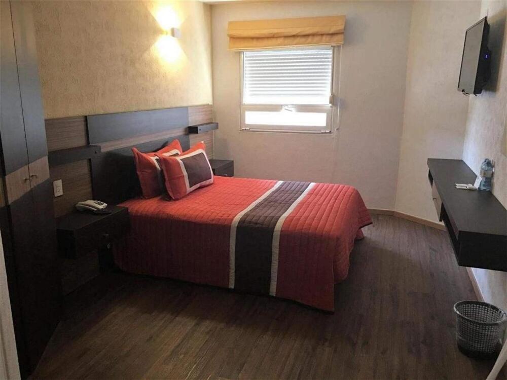 Foto de una habitación de Ibeurohotel Guadalajara Expo