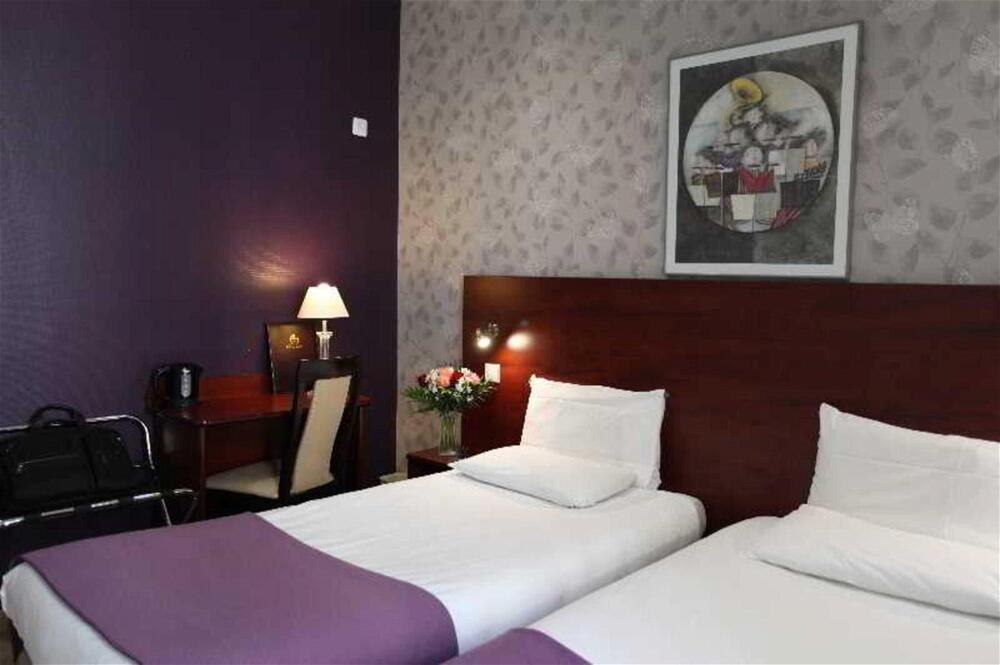 Foto de una habitación de Hôtel Alane