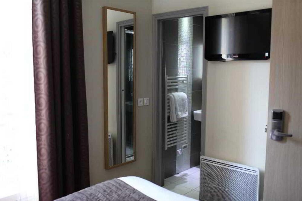 Foto de una habitación de Hôtel Alane