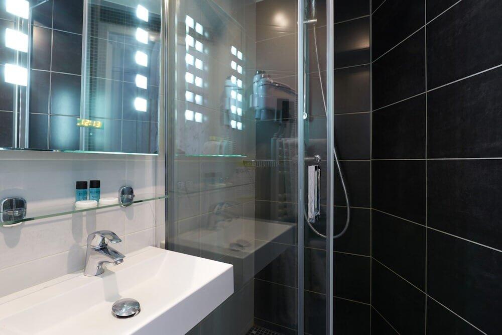 Foto del baño de Hôtel Alane