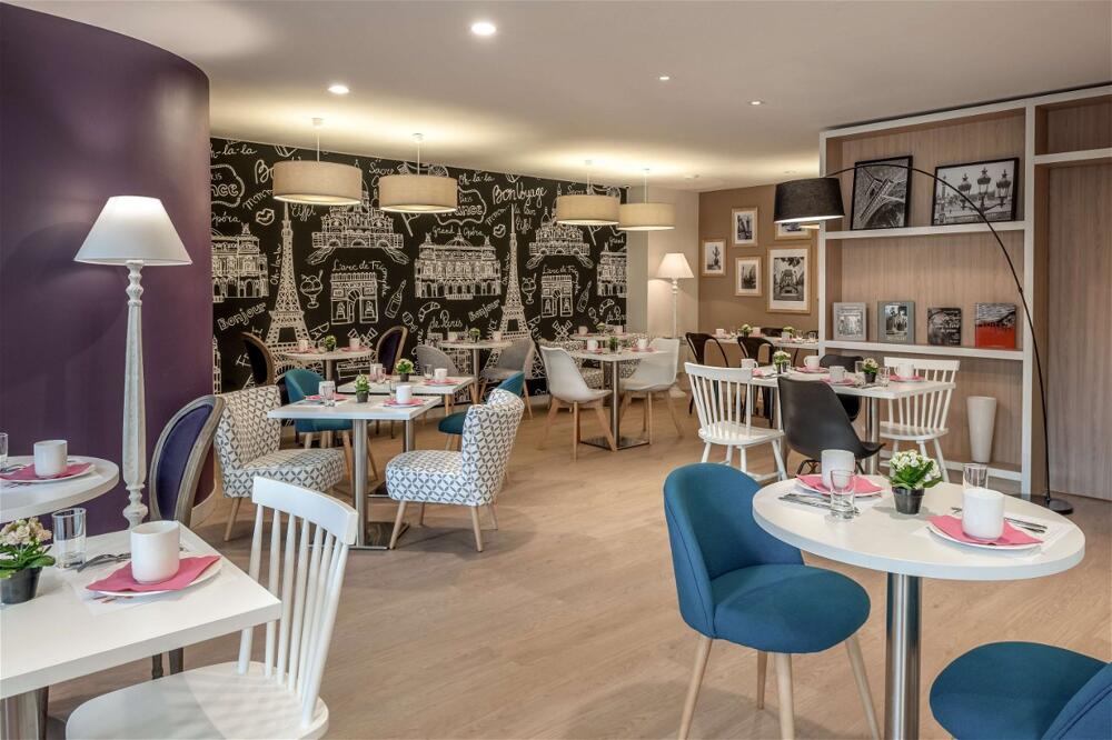 Foto de restauración de Aparthotel Citadines Montmartre Paris