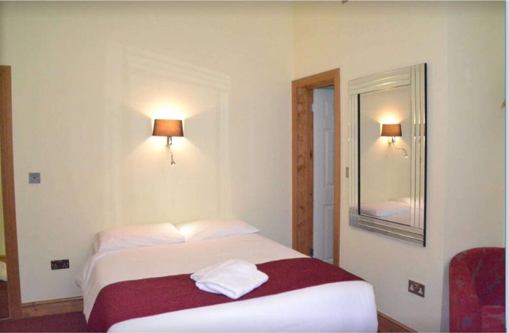 Foto de una habitación de Hotel 65