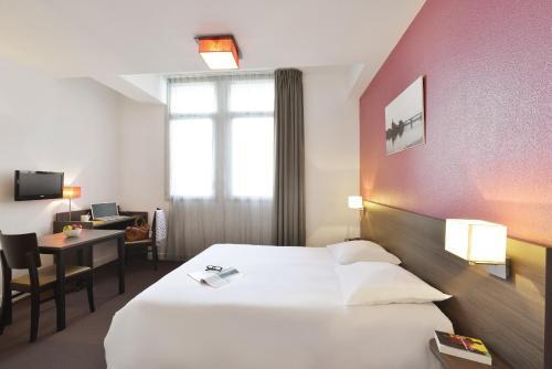 Foto de una habitación de Aparthotel Adagio Access Toulouse St Cyprien