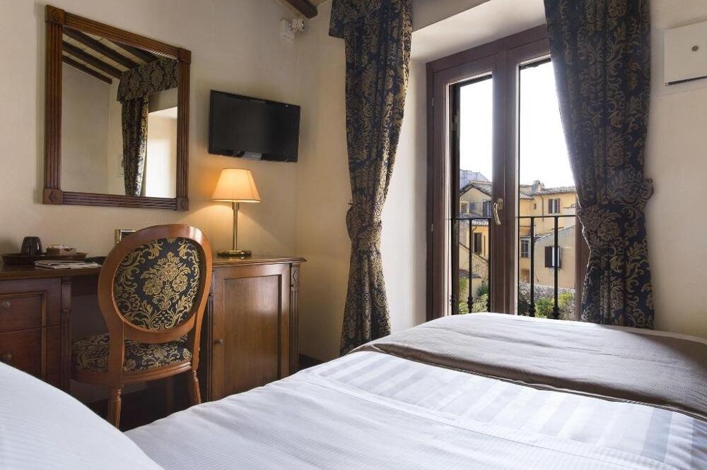 Foto de una habitación de Hotel Teatro Pace