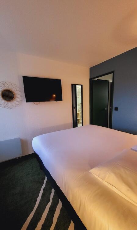 Foto de una habitación de Hotel Joinville Hippodrome