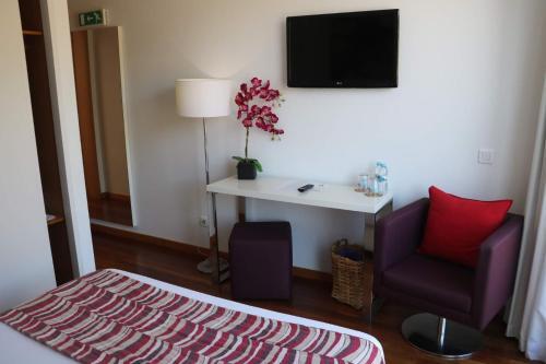 Foto de una habitación de LBV House Hotel