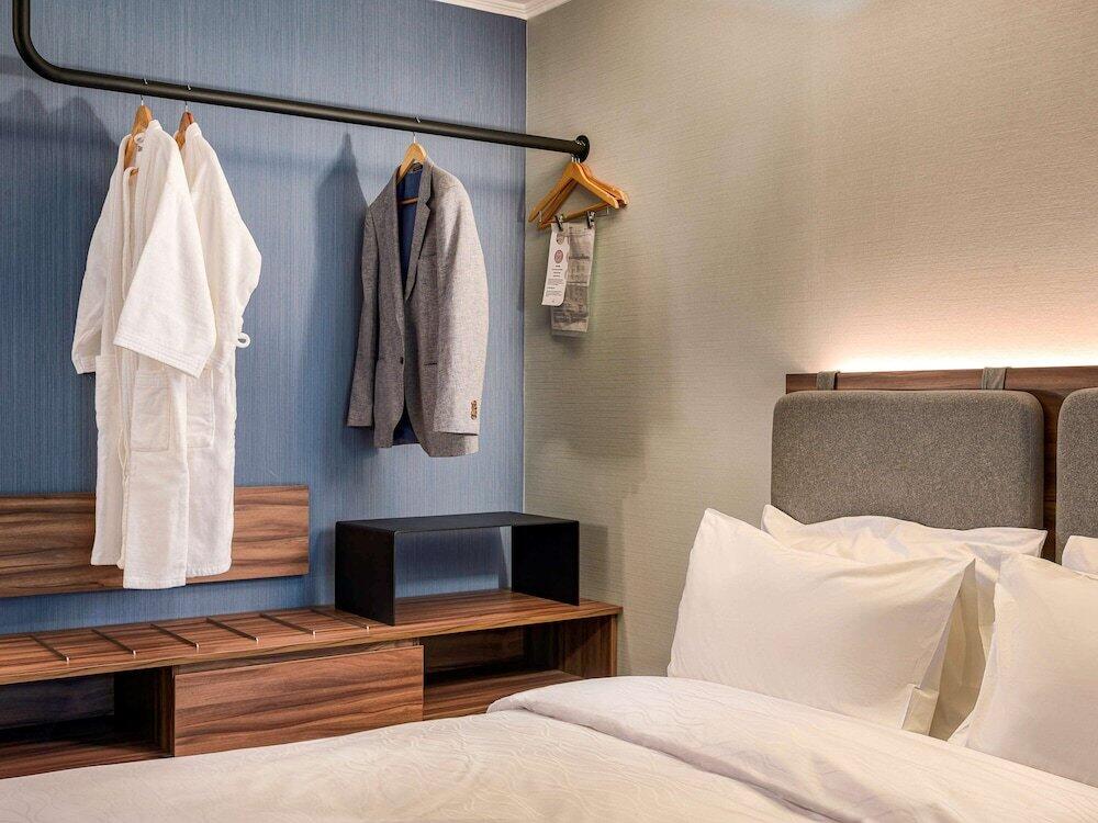 Foto de una habitación de Hotel Novotel Santiago Las Condes
