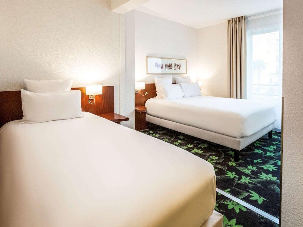 Foto de una habitación de Hotel Mercure Lourdes Impérial