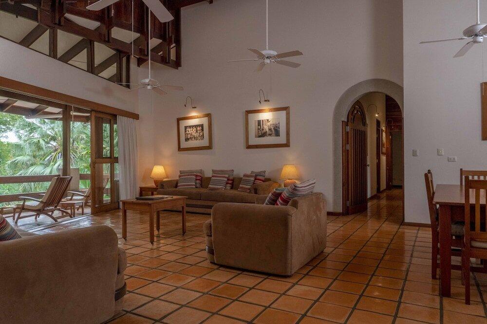 Foto de una habitación de Capitán Suizo Beachfront Boutique Hotel