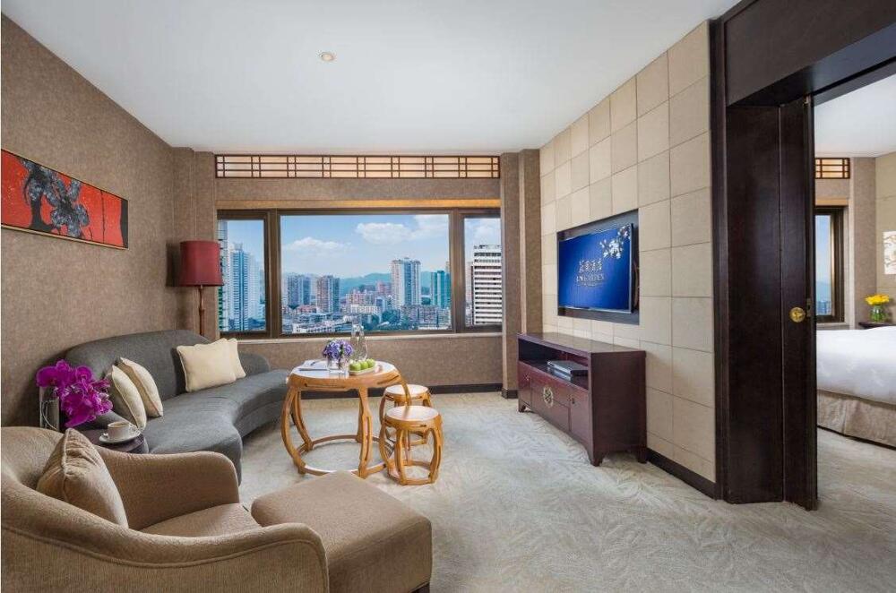 Foto de una habitación de The Garden Hotel Guangzhou - Free shuttle between hotel and Exhibition Center during Canton Fair &amp;amp; Exhibitor registration Counter