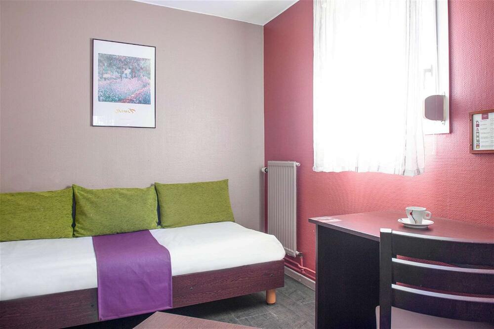 Foto de una habitación de The Originals City, Hôtel Ascotel, Lille Est Grand Stade (Inter-Hotel)