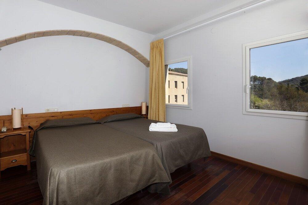 Foto de una habitación de Hotel Monestir de Les Avellanes