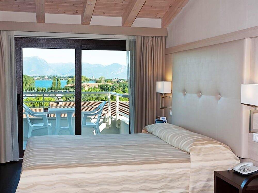 Foto de una habitación de Hotel Porto Azzurro