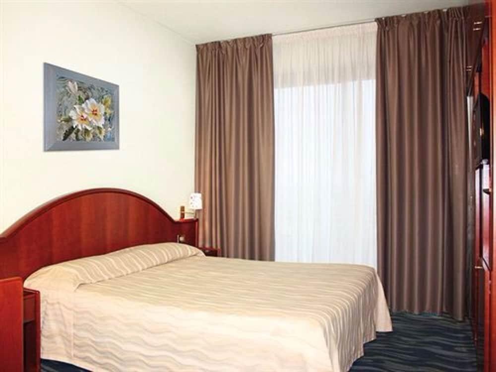 Foto de una habitación de Hotel Porto Azzurro