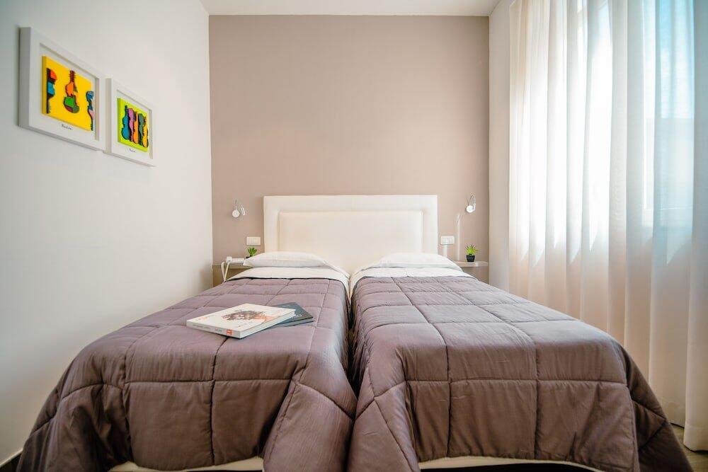 Foto de una habitación de Hotel Bruman Salerno