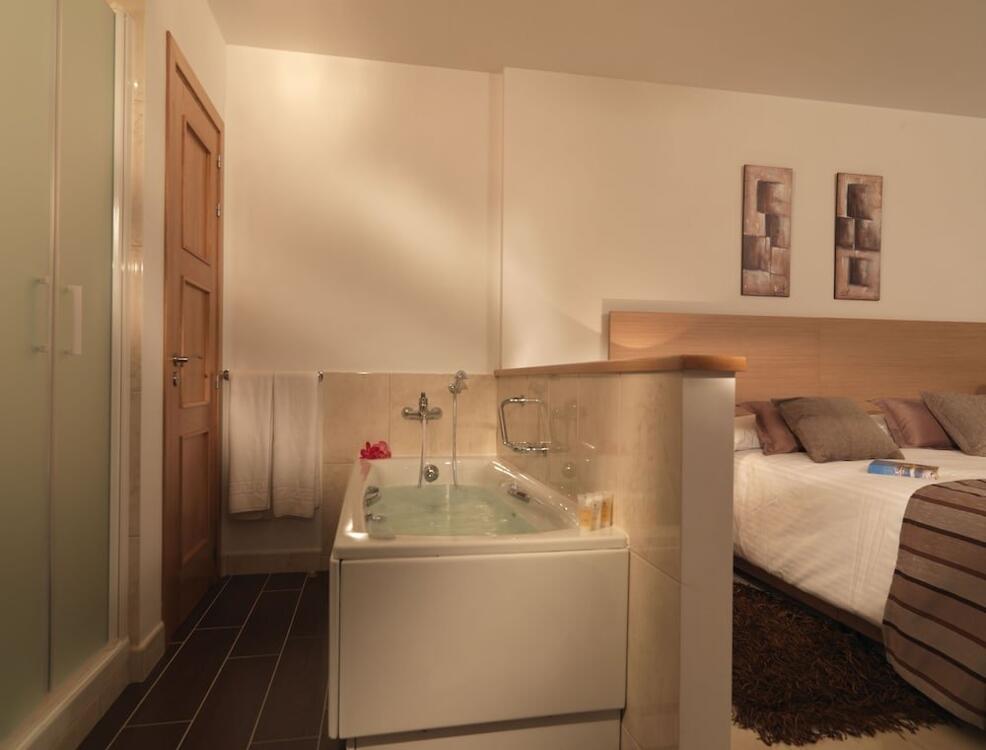 Foto de una habitación de Apartamentos Macdonald La Ermita Resort
