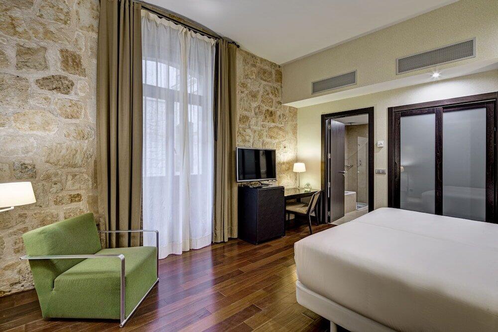 Foto de una habitación de Hotel Sercotel Puerta de la Catedral