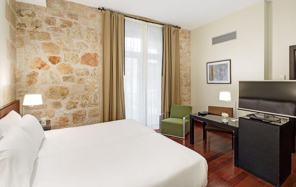 Foto de una habitación de Hotel Sercotel Puerta de la Catedral